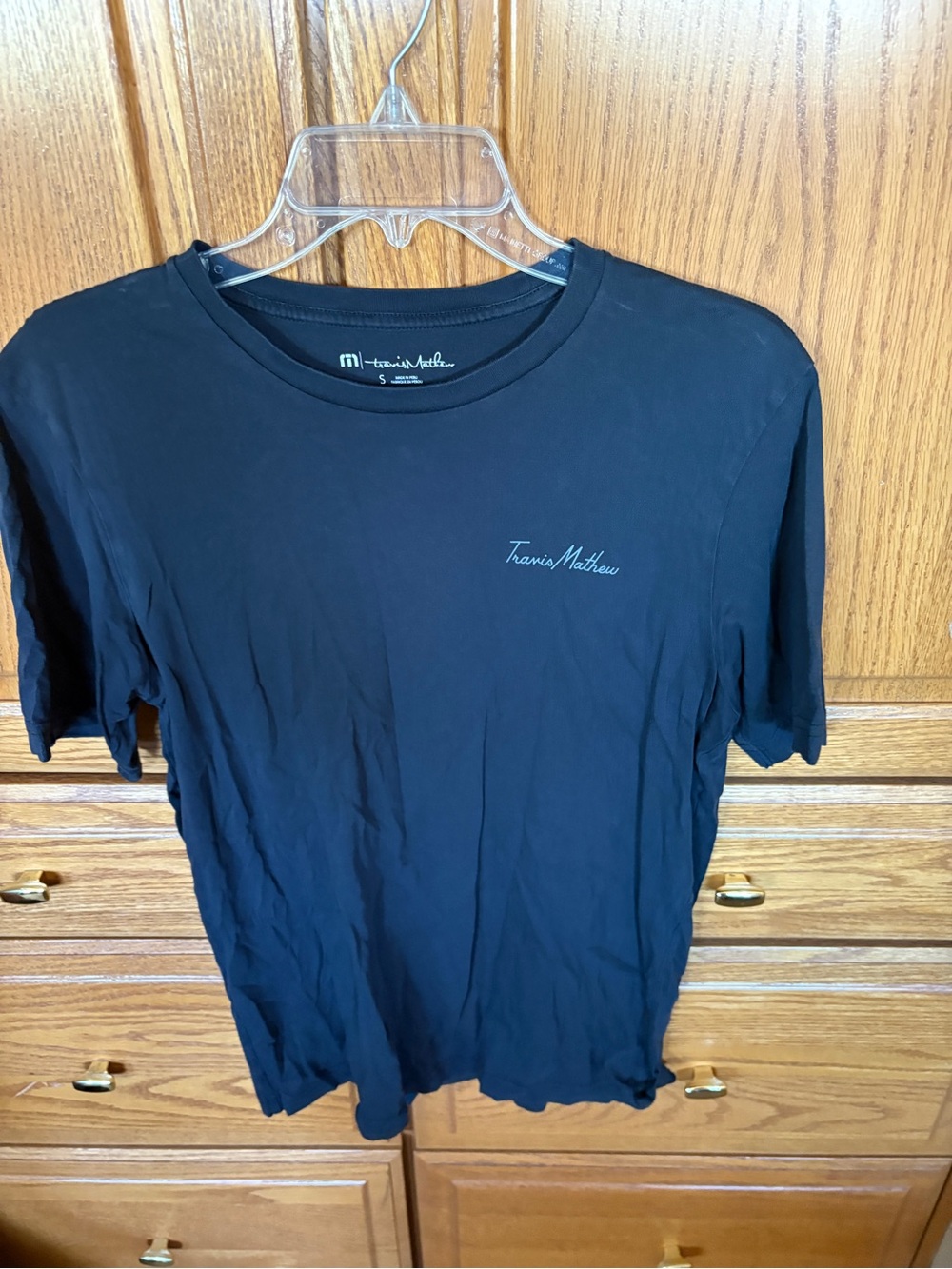 Travis Mathew Black Short Sleeve Crewneck Tee with Script Logo